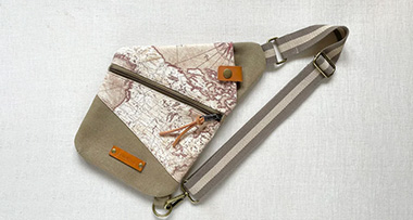 a traveller pouch on a textured white background